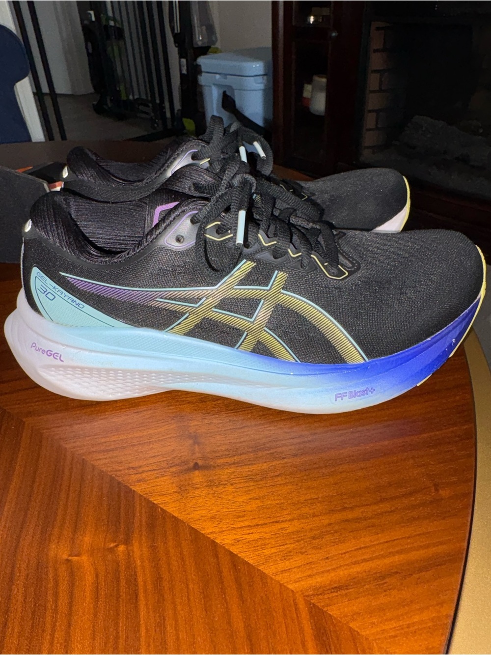 Asics Women's Black Running Shoes with Blue and Teal Gradient Midsole